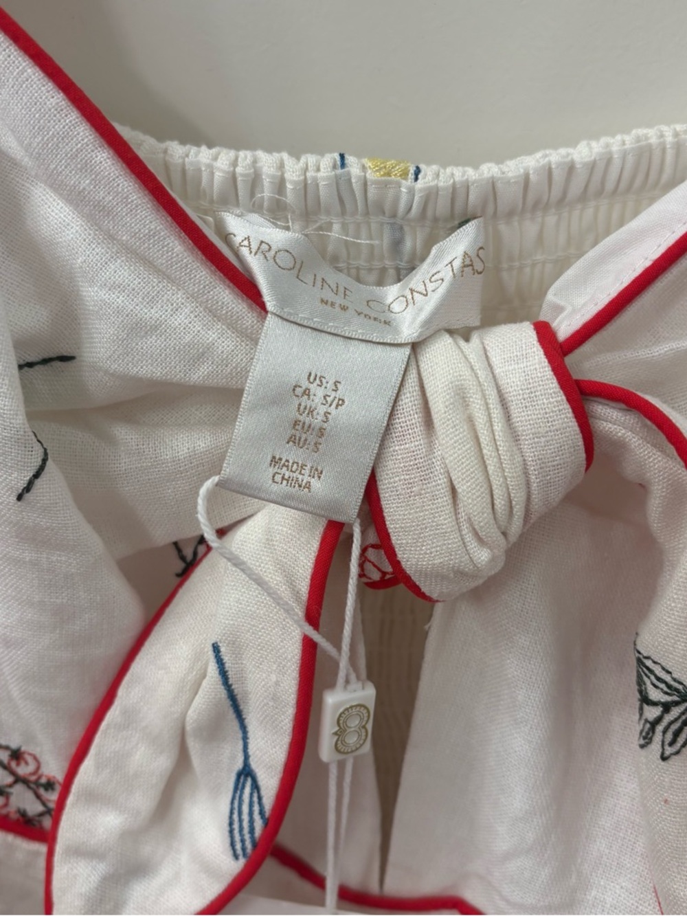 NWT Caroline Constas White Romper
embroidered size small - Picture 9 of 11